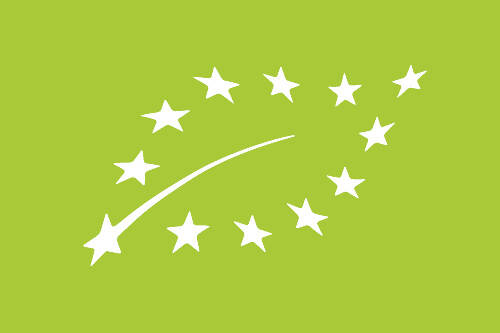 Illustratie van twaalf witte sterren in de vorm van een blaadje op een groene achtergrond